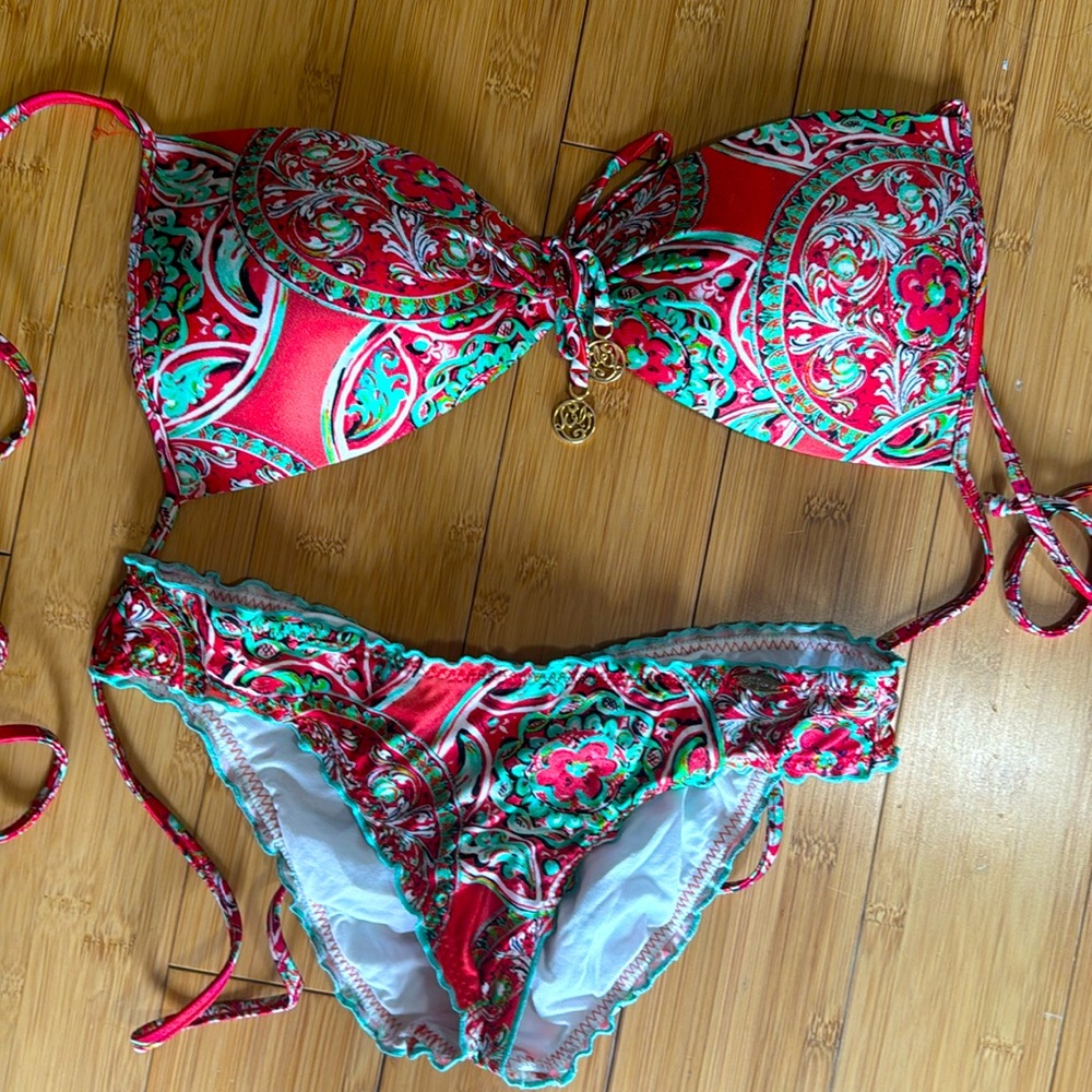 Luli Fama bikini. Size L top and Med bottom. Bottom fits like a small.